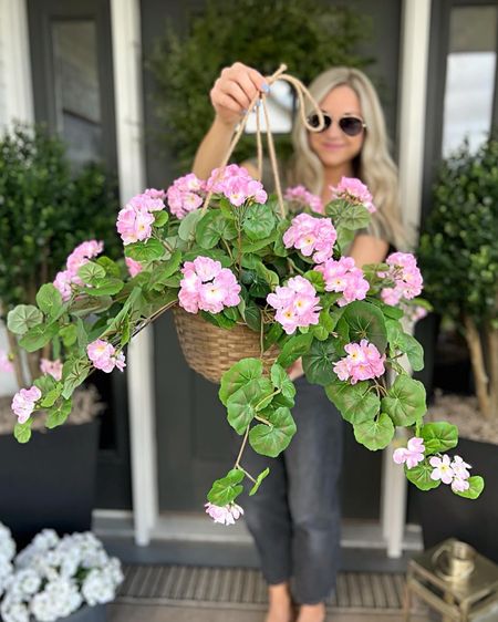 Faux hanging baskets! 
Very realistic. No maintenance.
30%off code: BLESSEDRANCH30