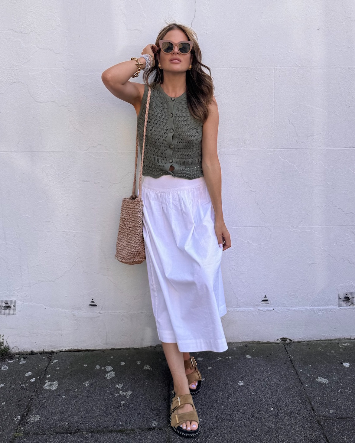 Khaki green crochet waistcoat | White maxi skirt | Raffia bucket bag | Chunky sandals | Chunky sunglasses | Gold jewellery | Holiday outfits

Summer outfit | Nobody’s Child #LTKsummer

#LTKuk #LTKeurope