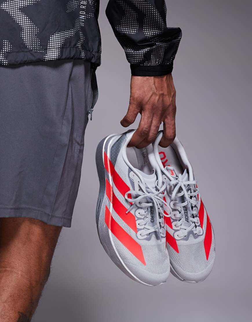 adidas Running Adizero Evo SL sneakers in light gray and red | ASOS (Global)