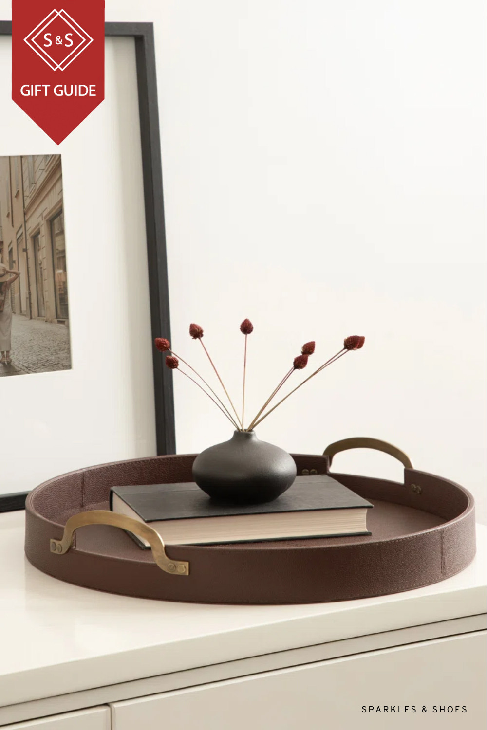 A chic gift for the hostess, for him, or for in-laws – this Round Vegan Leather Tray with Handles. It is less than $100 at Wayfair – need I say more?

#LTKCyberWeek #LTKHoliday #LTKGiftGuide
