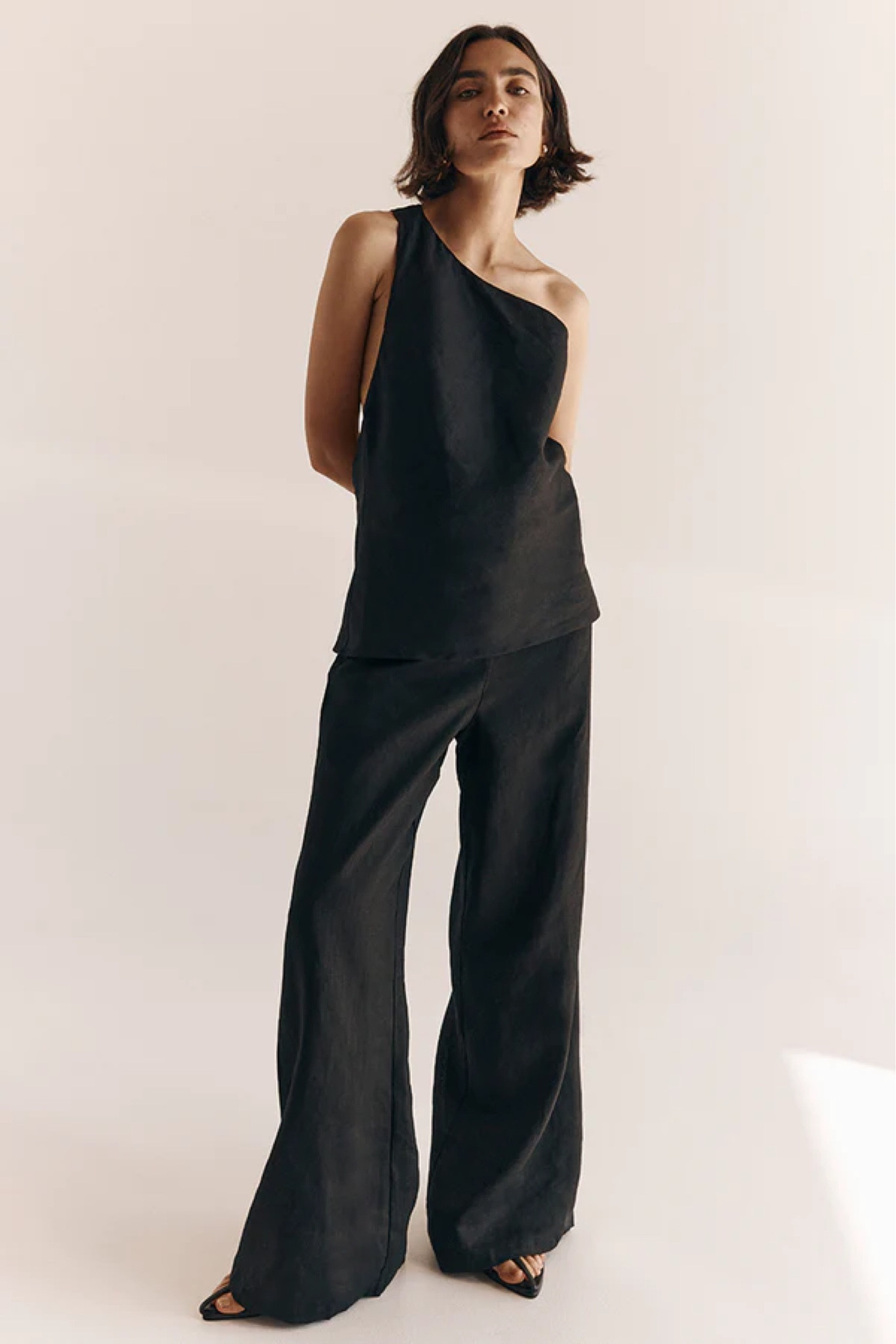 All black linen outfit by Dissh🖤 These wide leg pants are so chic and made with breathable material. I love how they look with high heels 👠 The asymmetrical linen top is also one-of-a-kind. 


Asymmetrical top
Asymmetrical shirt 
Off the shoulder top 
Monochromatic outfit 
Chic outfit 
Linen outfit 
Linen suit 
Black linen 
Asymmetric cold shoulder top 
One shoulder top
Wide-leg pants 
Tailored pants 
Women’s trousers 
High waist pants 
Front pleats 

#LTKstyletip