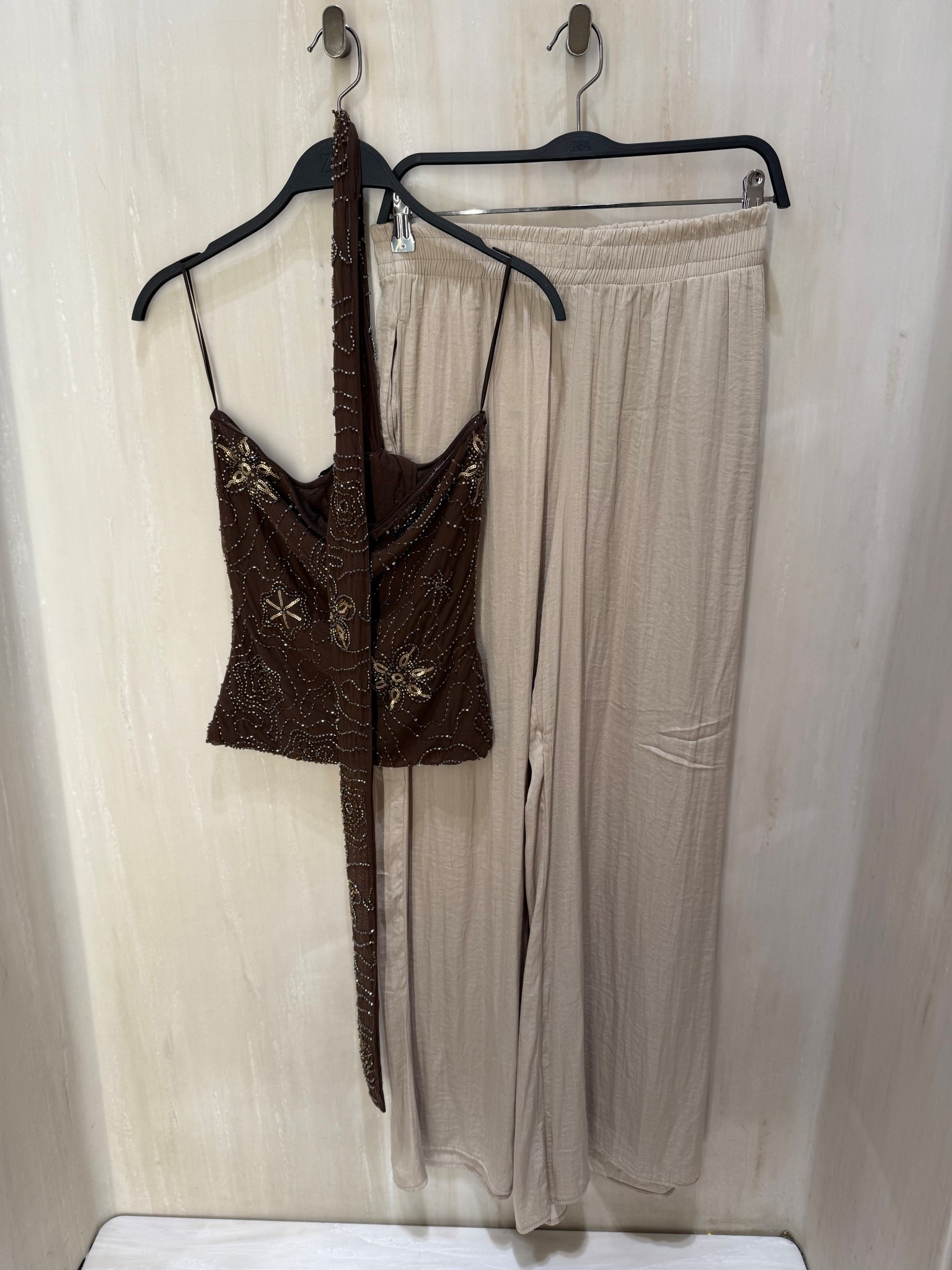 Satin trousers & embellished top✨
Tags: beaded neck sequin star print brown Ibiza party wear flowing pants Zara fashion summer inspo golden hour outfit ideas chic women’s style date night special occasion Dubai holiday vacationn

#LTKsummer #LTKstyletip