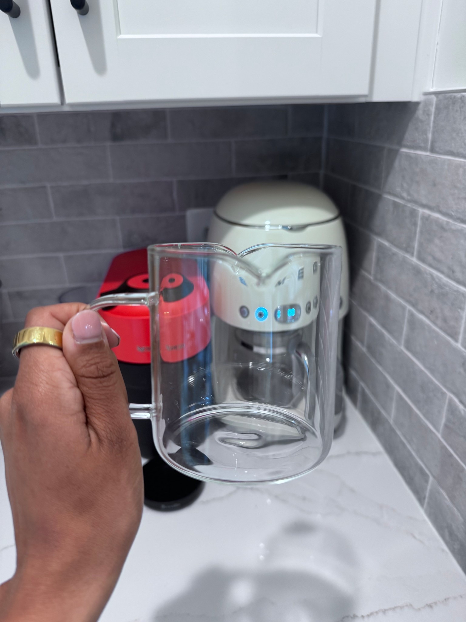 My pour cup that goes from whatever coffee machine I use that morning into my plastic cup. Easy pour support. 

#LTKmorningroutine