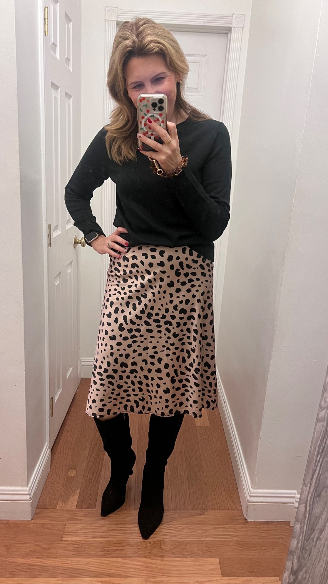 Easy outfit formula: boots, satin skirt, knit top. 👏🏼

#LTKootd #LTKOver40 #LTKFindsUnder100