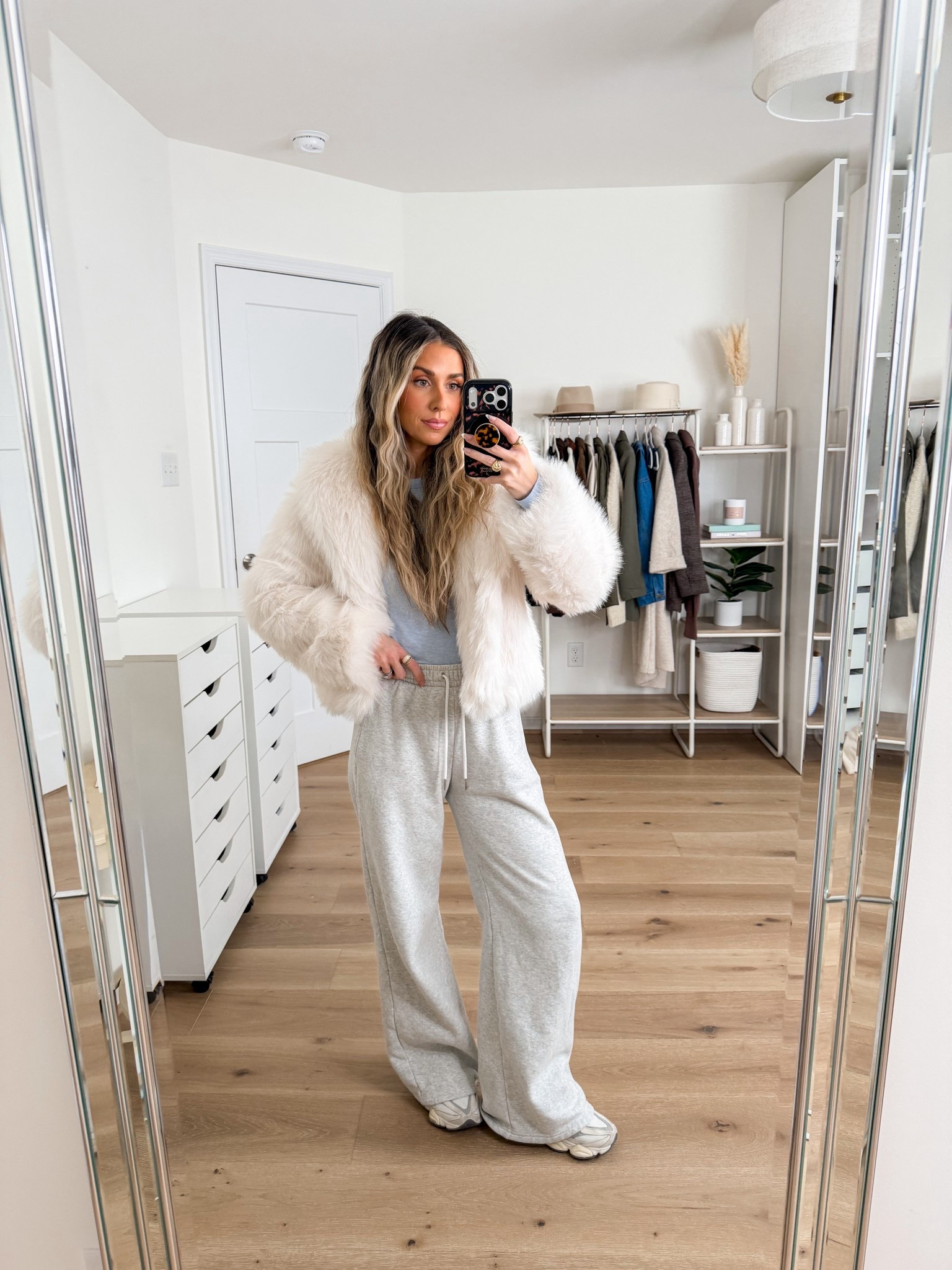 Ideal cold weather travel outfit or running errands! 
+ fur coat: xs 
+ top: xs 
+ sweatpants: xs 
+ new balance 9060s: true to size 

#LTKootd #LTKdayinmylife #LTKFindsUnder100