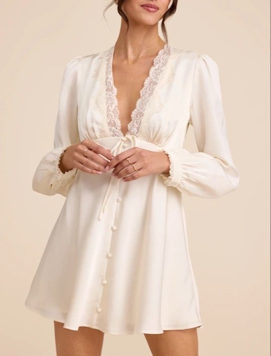 Soft, romantic, and effortlessly elegant — the Goldia ivory satin long sleeve babydoll mini dress is the perfect blend of luxury and femininity. Under $60.

Keywords: Mini dress, mini white dress, babydoll dress, mini lace dress, garden party, bachelorette party, bridal shower, engagement party, travel dress, vacation dress, resort outfits 2026, spring outfits women, spring dresses, summer dresses women, summer outfits women 

#LTKTravel #LTKWedding #LTKFestival