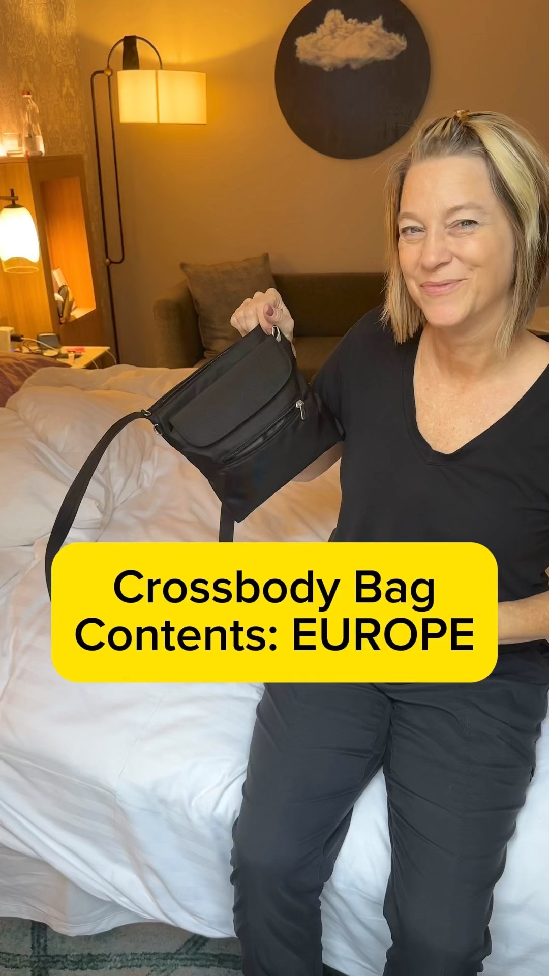 Crossbody bag contents for Europe: I traveled with a tiny umbrella, the 2 sided glasses case and this anti theft pickpocket slash-resistant straps crossbody bag Shirt is size medium and so perfect #LTKHoliday 

#LTKSeasonal #LTKtravel
