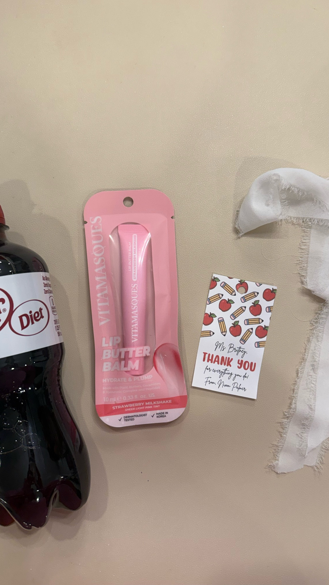 It’s Teacher Appreciation Week, so let’s make a super easy + affordable gift together 🍎✏️

All you need:
• A drink (because teachers deserve a little pick-me-up)
• A cute lip balm
• A printed tag (this one is an Etsy template!)
• Ribbon to tie it all together

Wrap it up, add the tag, and you’ve got a thoughtful gift that takes less than 5 minutes but still feels personal. Perfect if you’re making several for multiple teachers!

Simple. Cute. Budget-friendly. Teacher approved. ❤️

#LTKmomlife #LTKKids