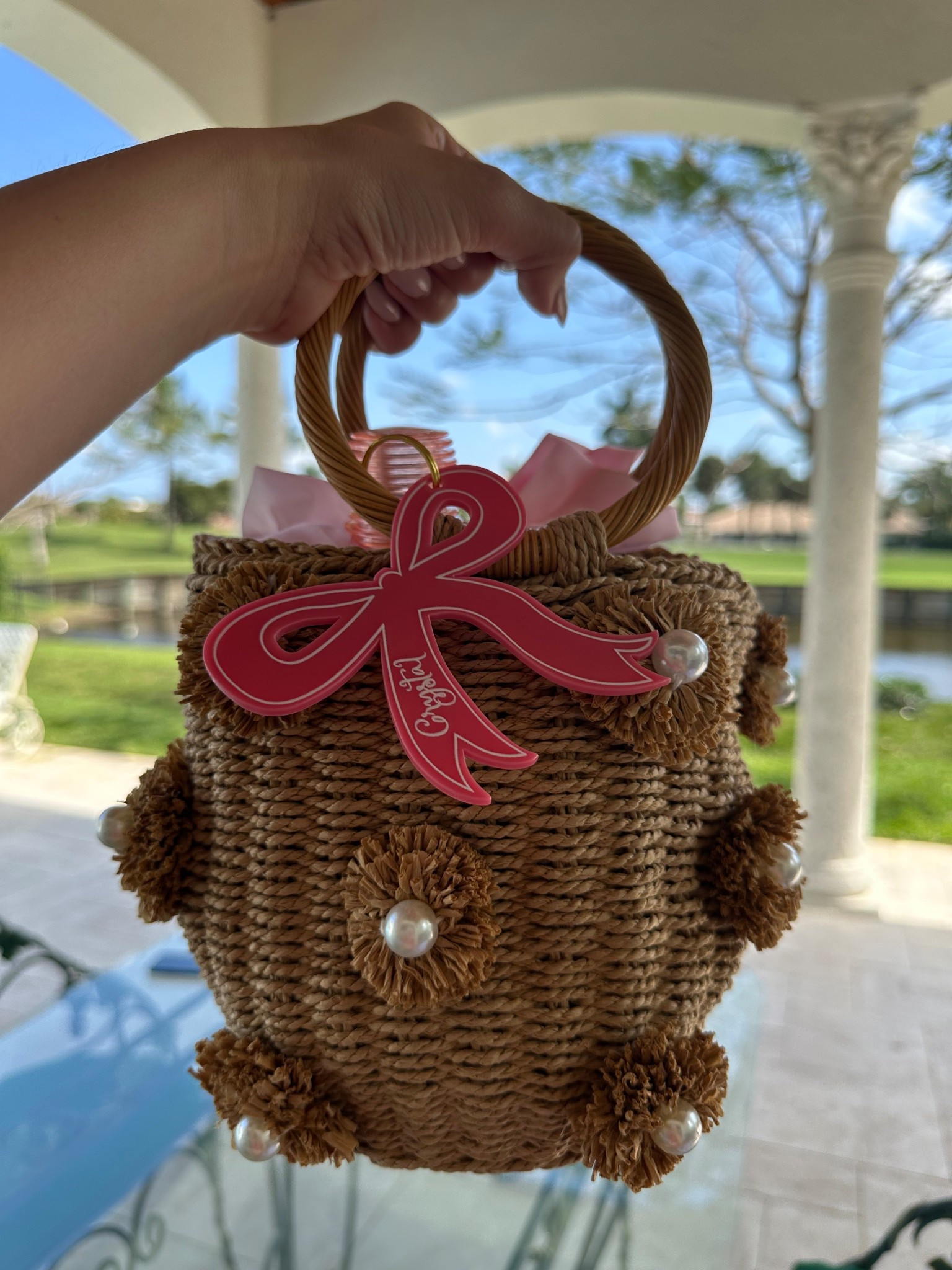The beach bag everyone compliments —pearl details, structured shape, drawstring closure. The bow was a custom touch. #LTKFinds #BeachStyle #Under5

#LTKSummerEdit #LTKSwim #LTKFindsUnder50