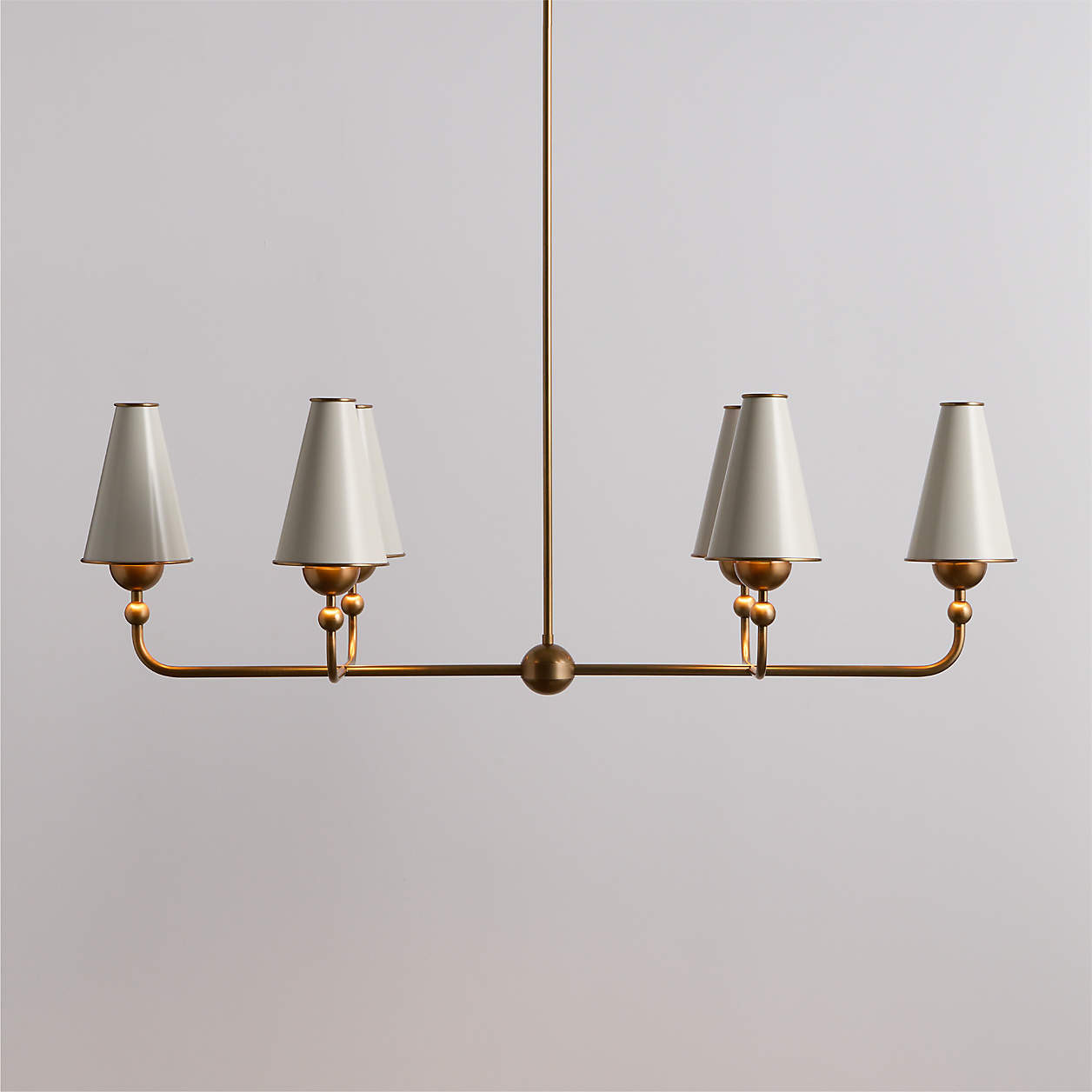 Everton Brass Linear Chandelier Light with White Metal Shades | Crate & Barrel | Crate & Barrel