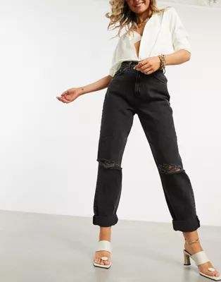 ASOS DESIGN high-rise 'slouchy' mom jeans in washed black with rips | ASOS (Global)