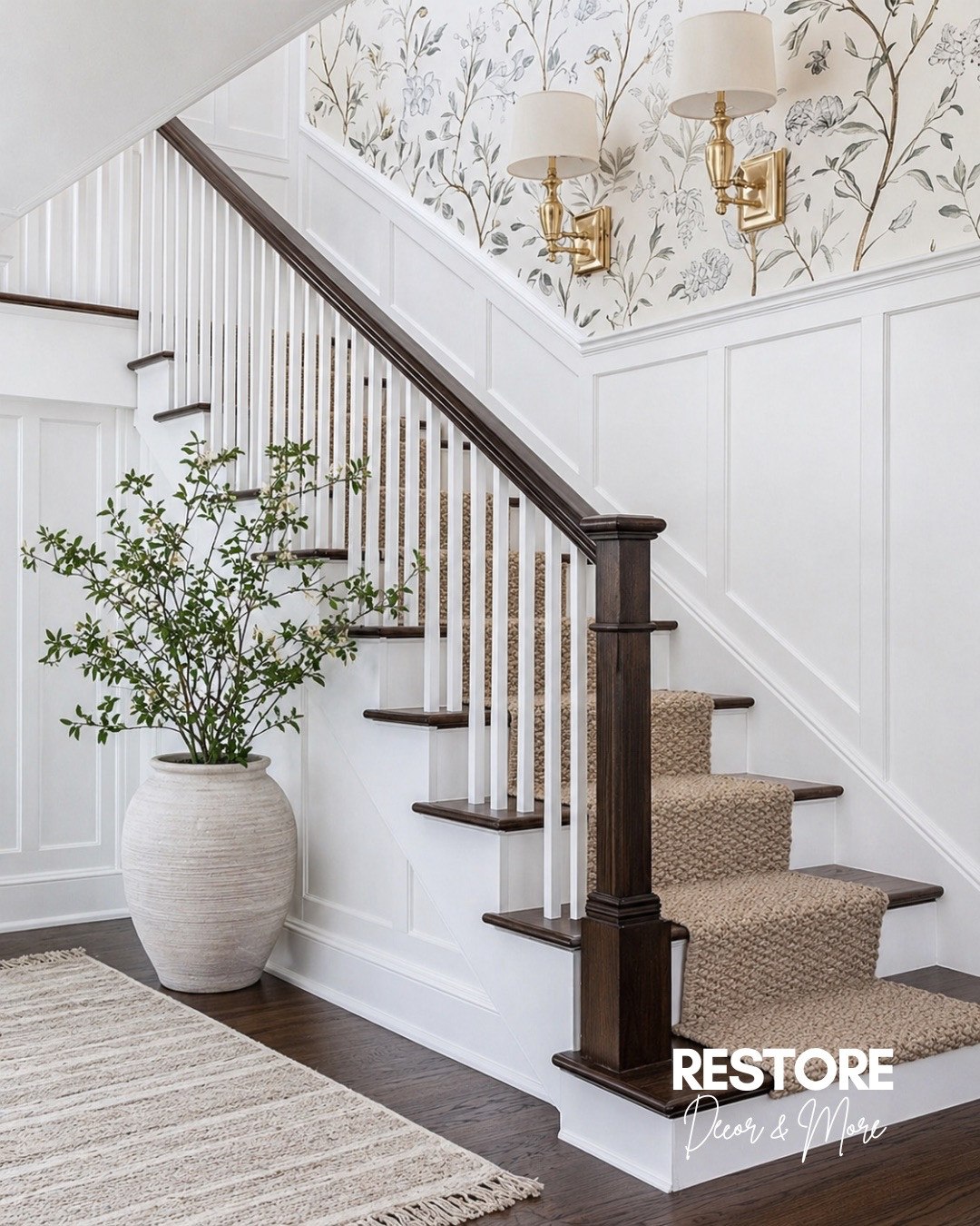 This staircase is everything 🤍
Clean white paneling, warm wood tones, and the prettiest wallpaper detail. It feels cozy but still elevated.

#ltkhome #ltkdecor #homedecorideas #entrywaydecor #staircaseinspo #modernfarmhouse #cozyhome #neutralhome #homeinspo #interiorinspo #homestyling #housegoals #warmandcozy #neutraldecor #farmhousestyle 

 #LTKHome