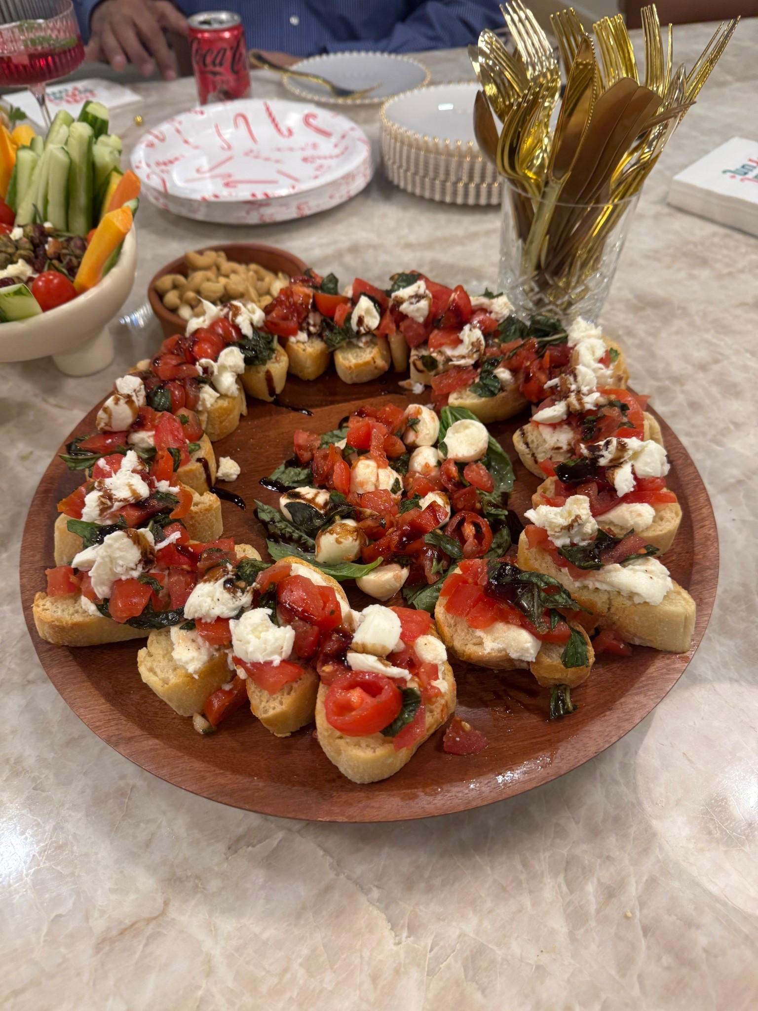 The perfect wood lazy susan for serving and only $22! I used it to serve my holiday bruschetta this year but I can already tell this will be a hosting staple for me!

#LTKfoodie #LTKHome #LTKHoliday