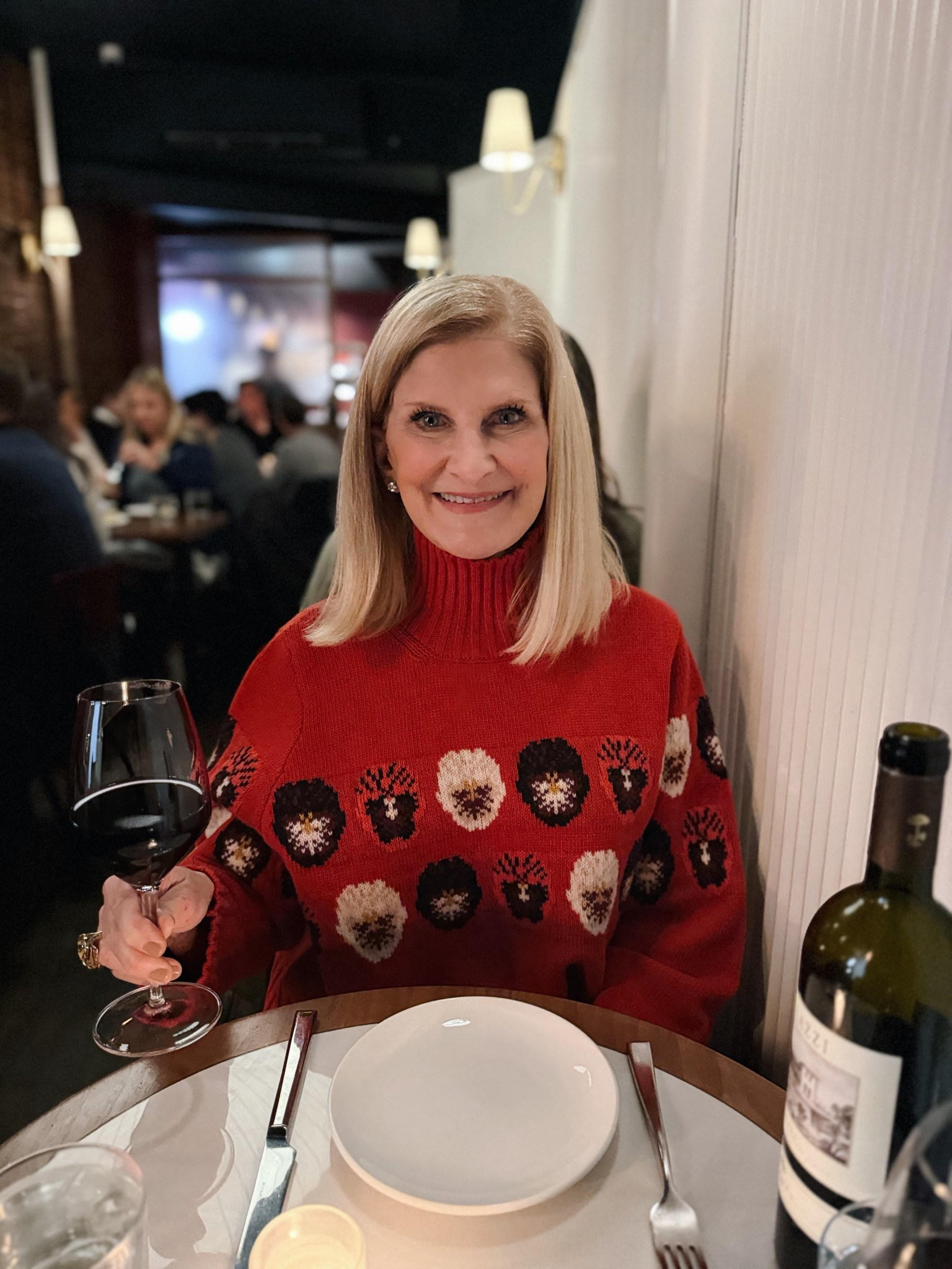 My mom looking so cute in the pansy sweater I found her! Theta love!