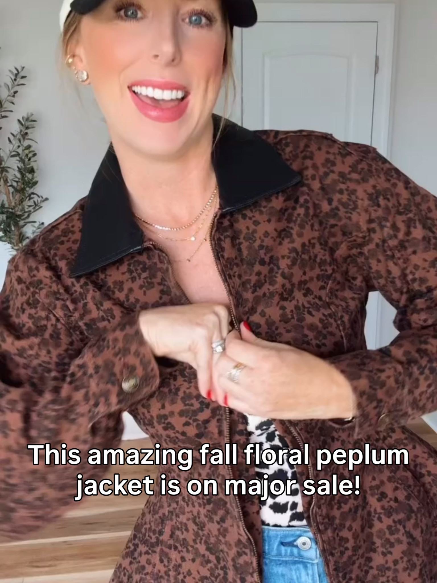 This gorgeous floral peplum jacket is on sale
