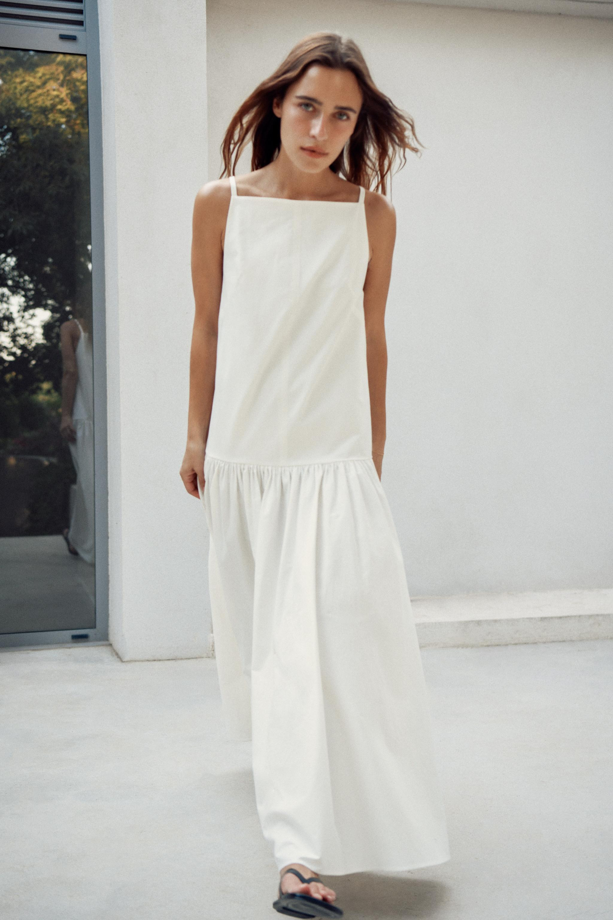 ZARA WOMAN COLLECTION. Dress made from a cotton blend yarn. Featuring a straight neckline and thi... | Zara UK