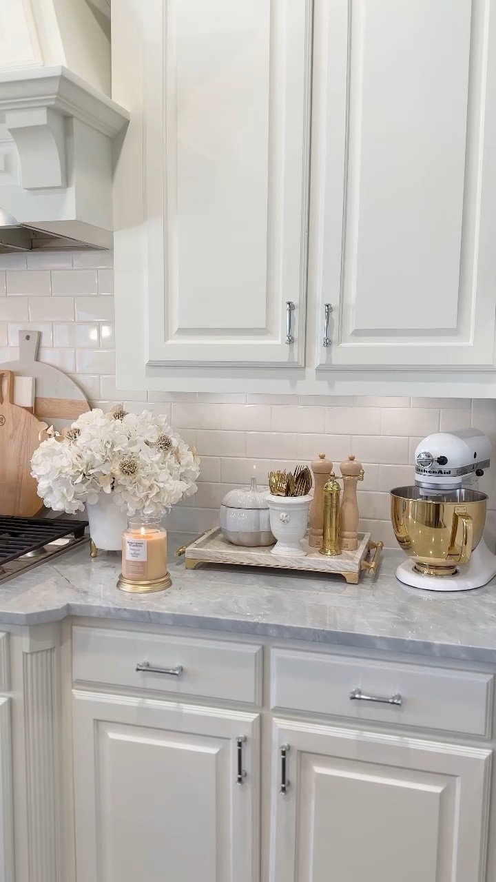 🍂 Happy first day of fall! 🍂 Do you decorate your kitchen for fall? I like to style my kitchen with simple seasonal touches like cozy candles, pumpkin shaped kitchenware and beautiful cookware that doubles as decor! ✨#walmartpartner I’m loving my recent Walmart Home finds and had to share my favorites right in time for fall! 

1. Pumpkin stoneware jar - comes with a lidded jar & 4 bowls perfect for fall treats or serving soup. 
2. Fall candles - these beautiful candles are under $14 and smell like freshly baked pumpkin pie! 
3. White & gold cookware set - this gorgeous 12 piece nonstick cookware set is perfect for cooking your favorite fall and holiday dishes in style! 
4. Harvest cakelet pan - make the ultimate fall treat with this mini pumpkin, acorn and leaf shaped cakelet pan 😍 So cute and easy to clean!
5. Cake stand and glass dome - a versatile piece that can used for displaying and preserving baked goods while adding a some warmth and texture to your countertops for fall

#LTKSeasonal #LTKhome #LTKstyletip