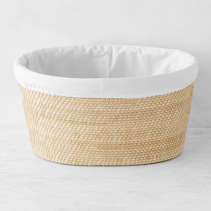 Hold Everything Rattan Laundry Baskets, Oval | Williams-Sonoma