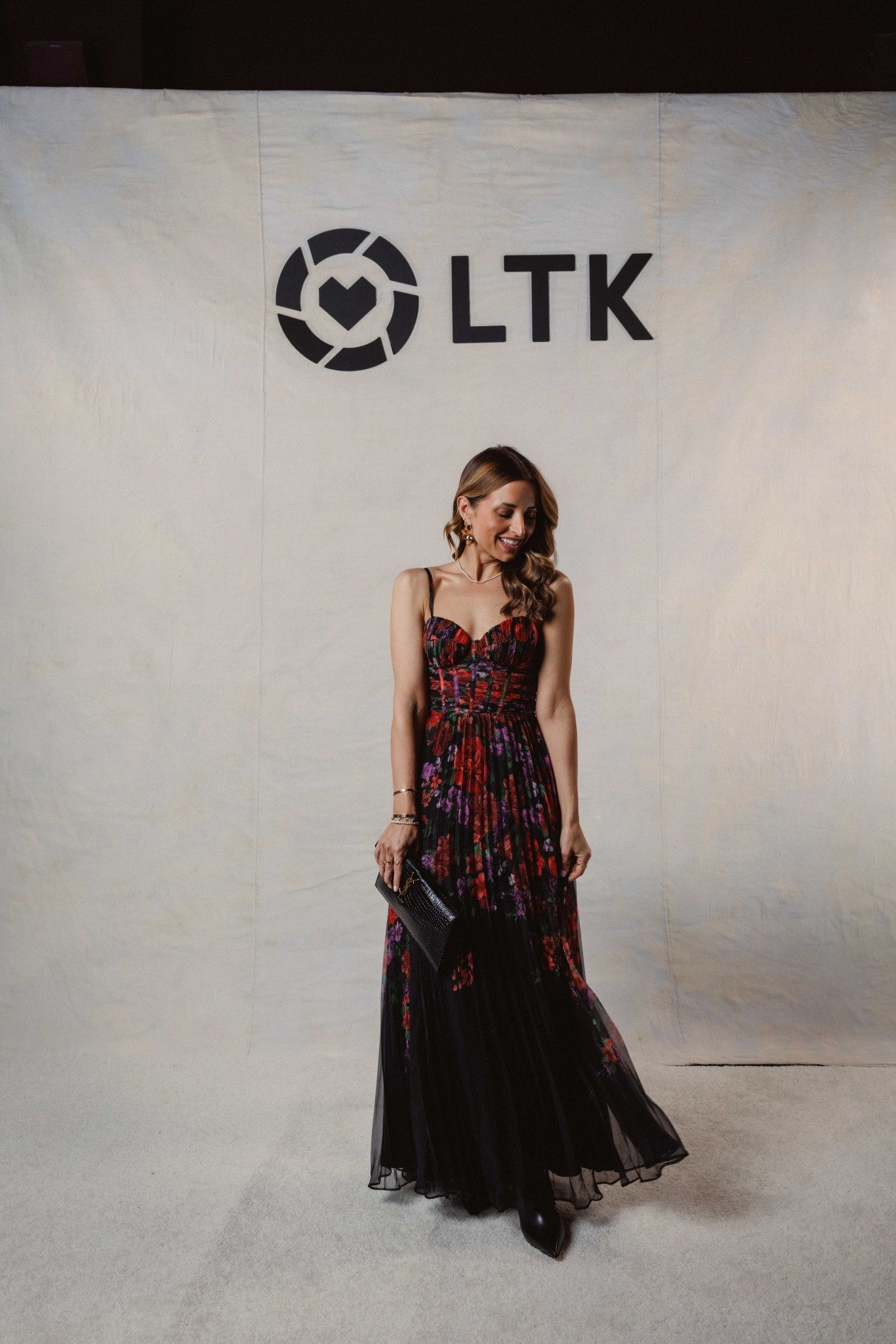 NYFW. Cocktail dress in XXS. Floral maxi dress. Party dress. Spring wedding guest. Summer wedding guest. Formal dress. Louboutin boots - I went up half a size to make room for socks. YSL clutch. 

#LTKValentine 

#LTKWedding #LTKTravel #LTKNYFW