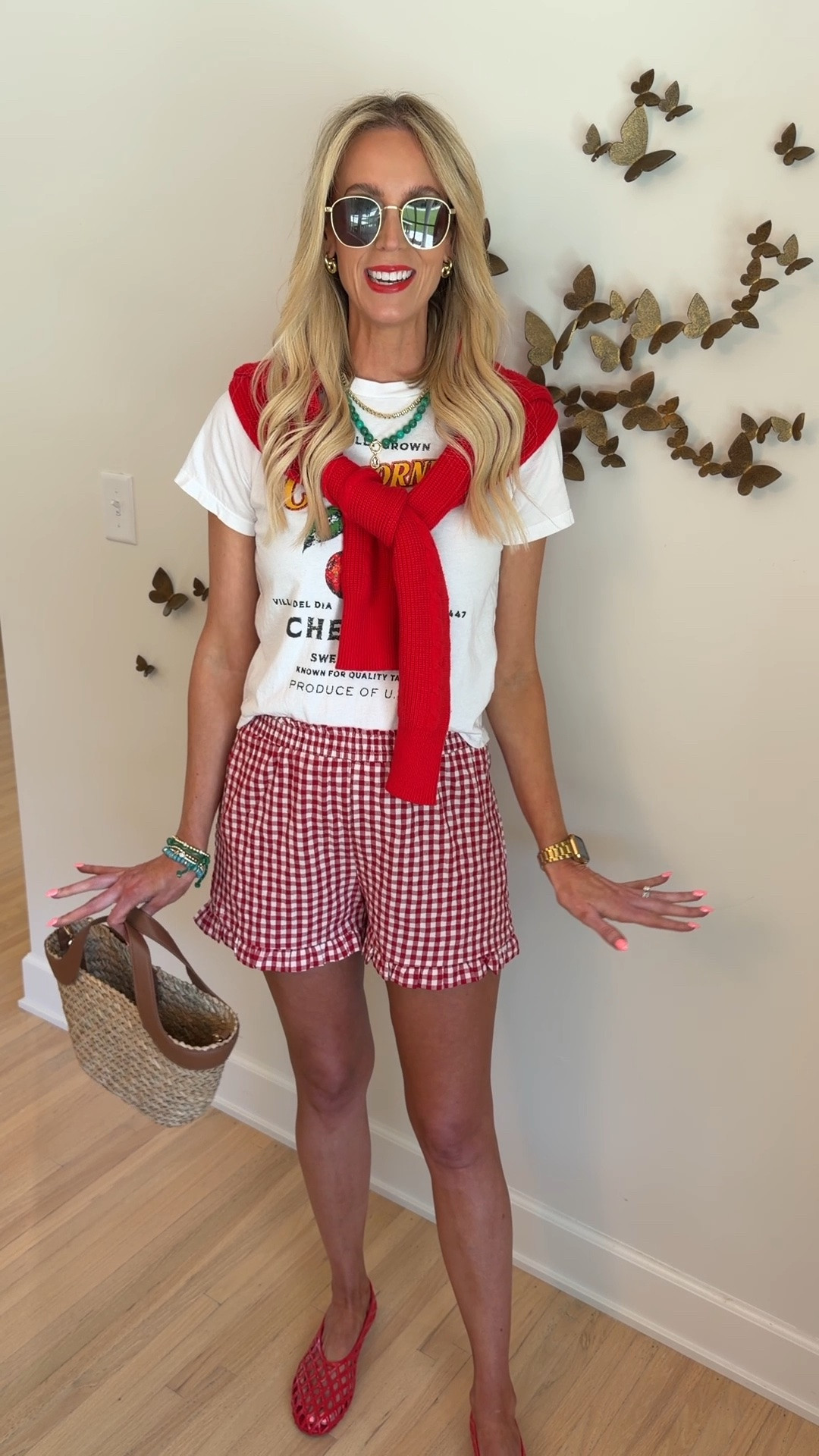 Red gingham ruffle shorts and cherry graphic tee outfit idea! Modern casual outfit idea and how to style elastic waist shorts! My shorts are the exact Amazon pair I linked, I just took the front tag off. 👏🏻