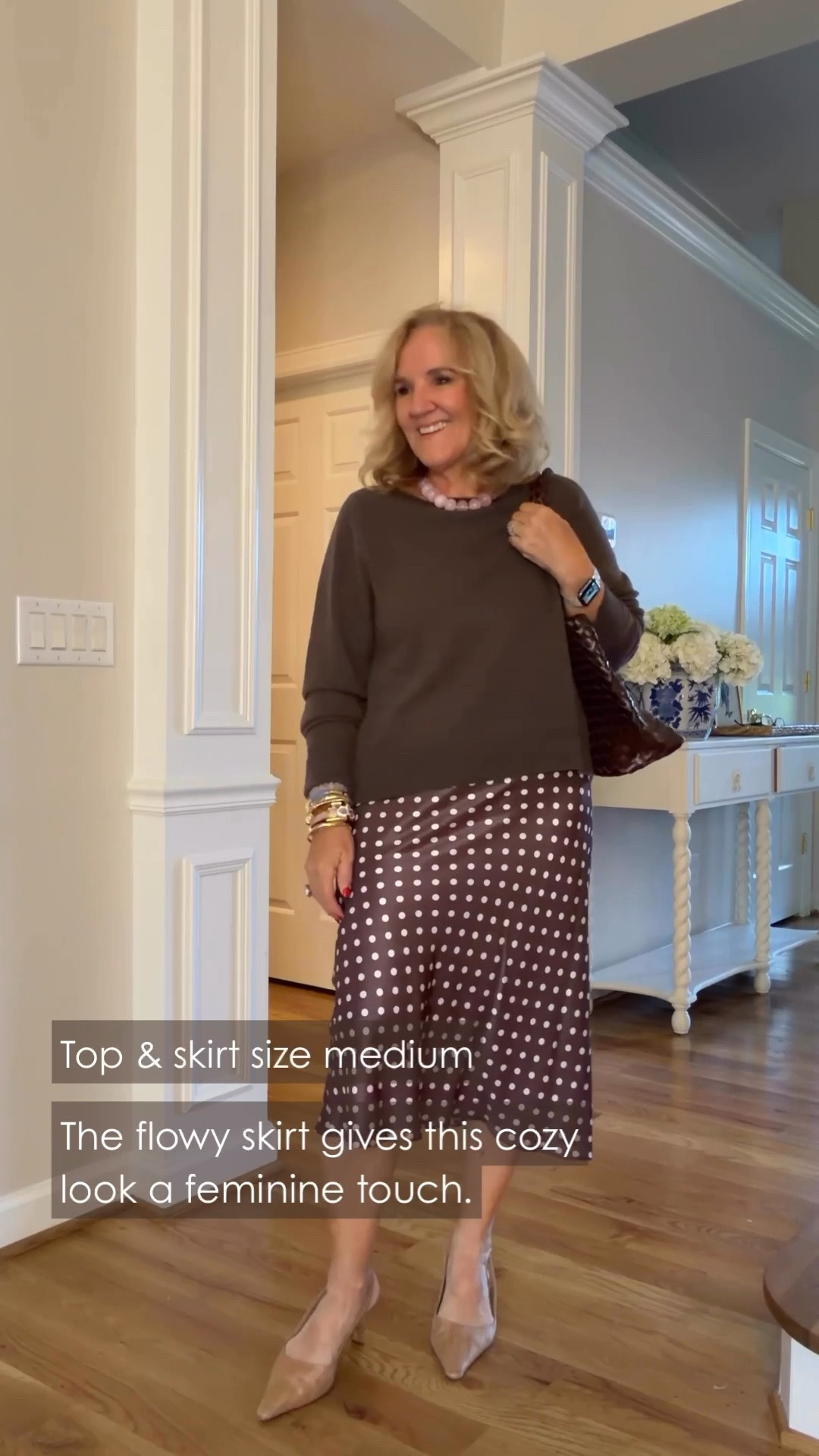 I really like the contrast of a cozy sweater with a flowy polka dot skirt. It feels feminine without being too dressy, and I'm wearing a medium in both pieces!
