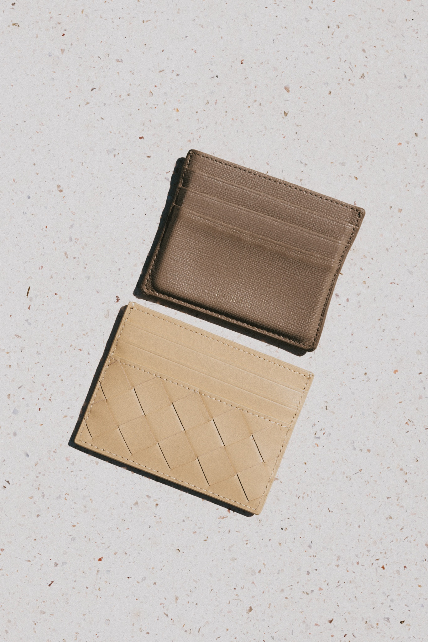 I’ve had this card case from Furla (the one in the top) for 7+ years and it’s finally time to upgrade it! It’s been a good run but it started looking a bit tired and worn out. 
Meet the replacement by Bottega Veneta: a 6 slot card case with a center pocket for bills in their signature intrecciato leather. I’ve been hunting down this particular oatmeal beige color for a while and I finally found it on SSENCE. 
💭💭💭

#LTKItBag #LTKSeasonal #LTKStyleTip