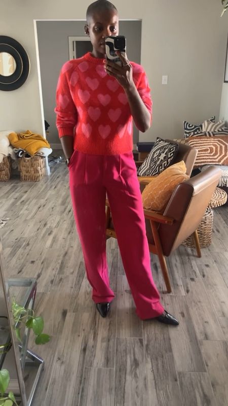 Easy Valentine’s look for the office or meet up with friends. Read and pink heart sweater, pink high waisted pants and black sling back kitten heels  

#LTKfindsunder100 #LTKworkwear #LTKSeasonal