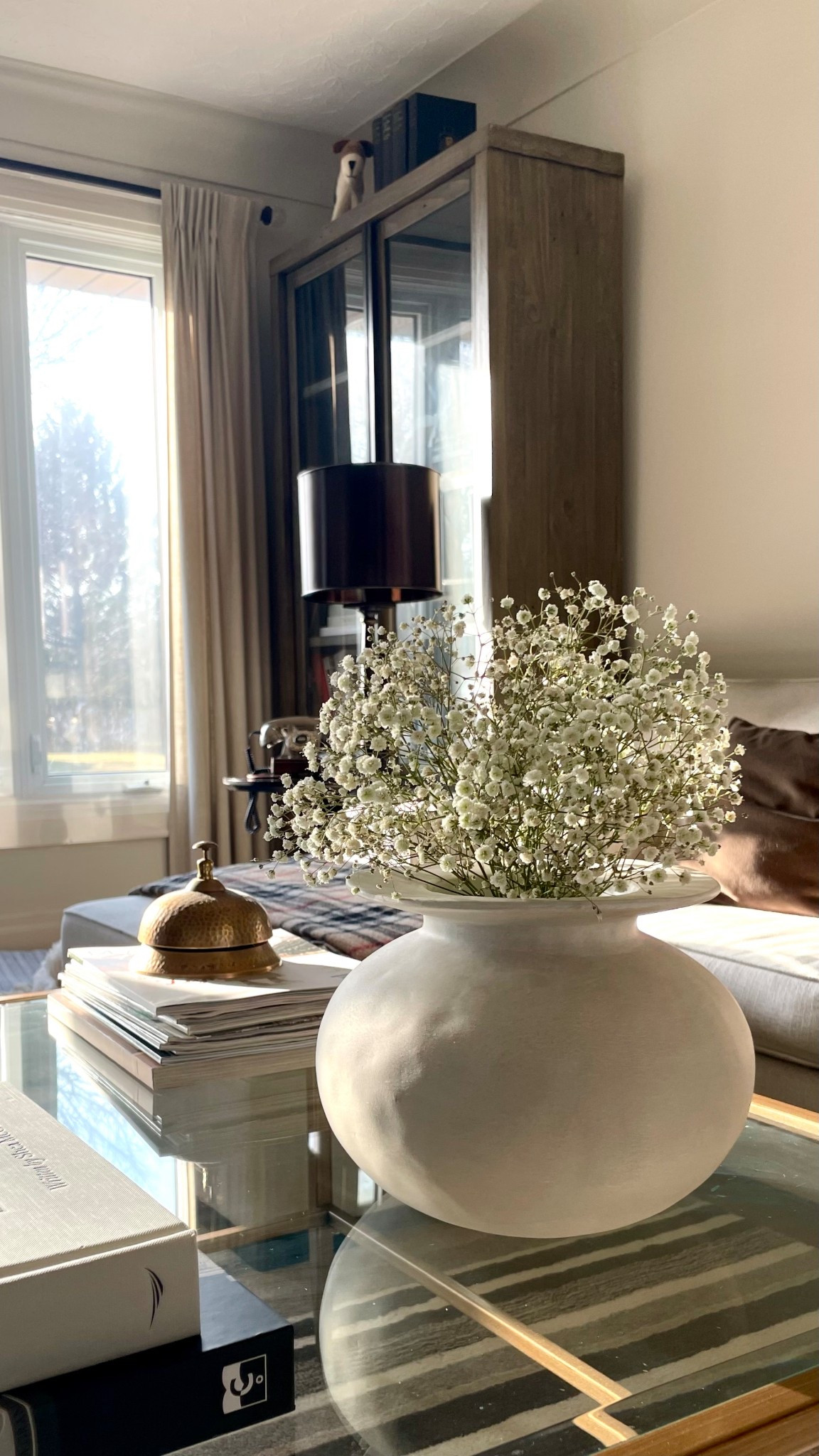 I love the simplicity of this vase. With its low profile, it’s easy to accessorize and many places. For me, the coffee was exactly what I had in mind. Never underestimate the power of bunching together some babies breath. It allows you to have real greenery at a very affordable price and had huge impact. Oh, and the scent… spring is in there! 

#LTKHome #LTKFindsUnder50 #LTKStyleTip