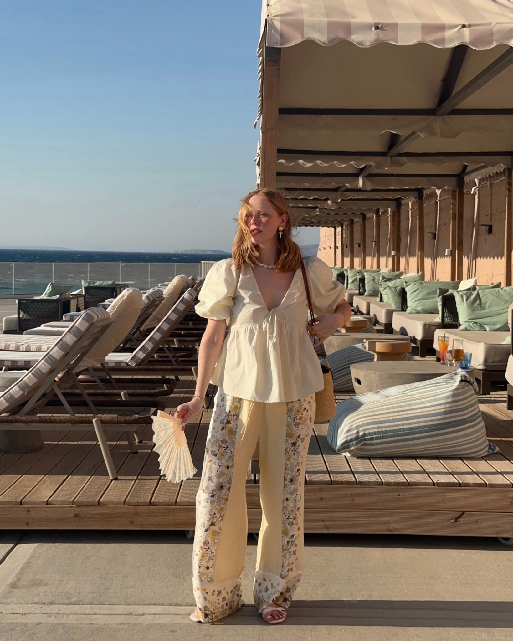 Topshop, ASOS, Cream Blouse, V Neck Blouse, MUNTHE, Silk Trousers, Floral Trousers, Lace Fan, Basket Bag, European Summer 

#LTKsummer #LTKeurope #LTKtravel