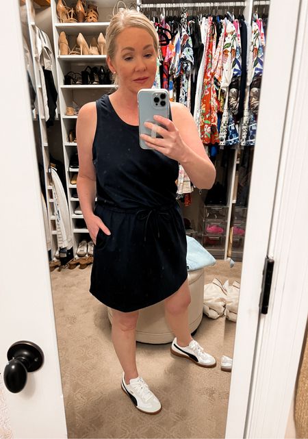 Sporty tennis or golf dress. Runs a tad big in the arms for me. Wearing a M in Navy but could have done a S. Adjustable tie waist. More colors. 

#LTKfitness #LTKover40 #LTKfindsunder100