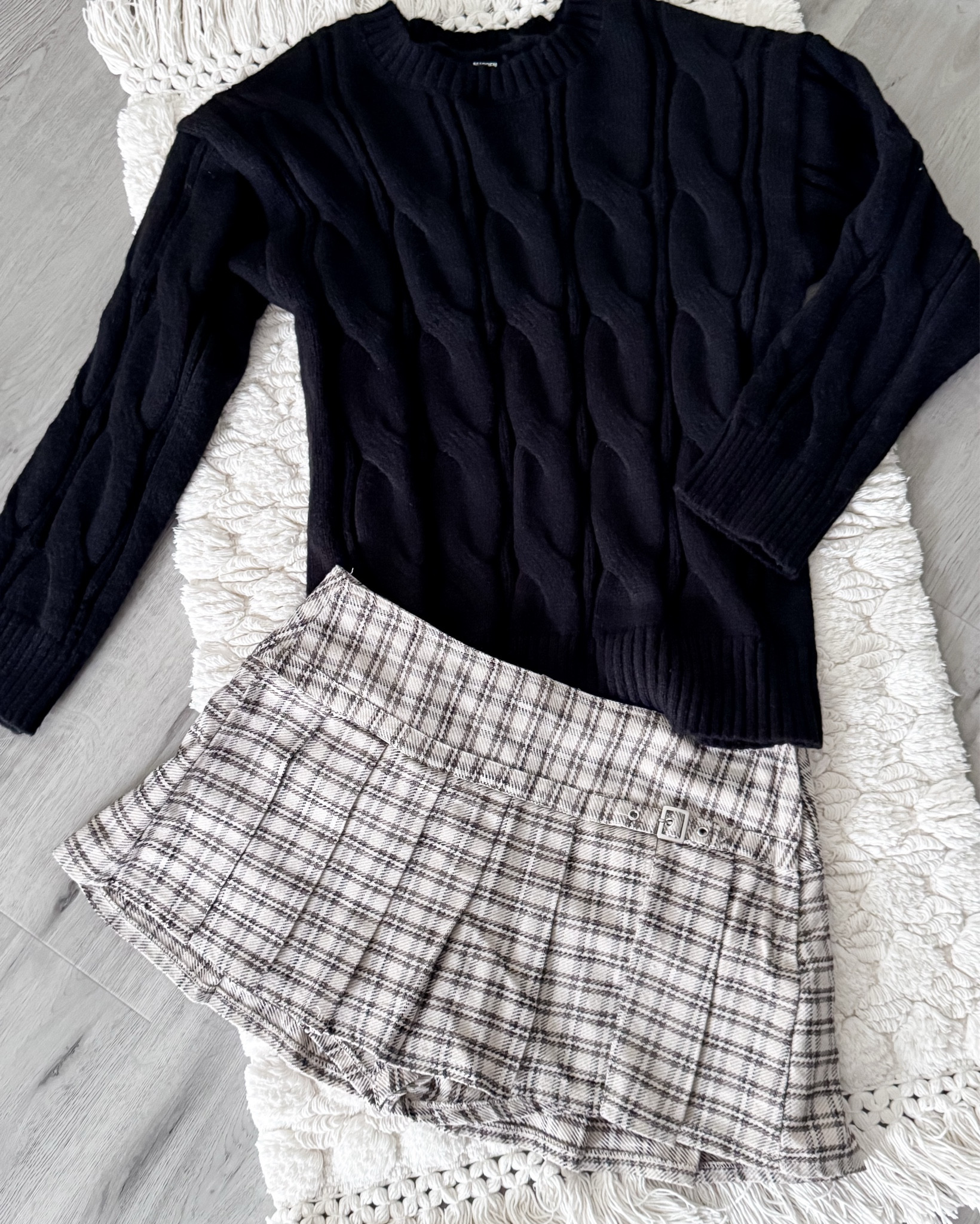 This adorable plaid skort + cable knit sweater combo is giving effortless holiday chic. The neutral plaid skort is structured yet flirty with its pleated silhouette, built-in comfort, and the cutest belted detail that elevates the whole look. Paired with a soft, cozy cable knit sweater in a classic winter hue, it’s the perfect blend of timeless and trendy.

This is my go-to outfit for holiday brunches, festive outings, family photos, Christmas shopping, or casual parties. Dress it up with tall boots and gold jewelry or keep it cozy with tights and loafers. It’s versatile, flattering, and so easy to wear. A must-have holiday staple that you’ll keep reaching for all season long.

If you love classic pieces with a modern edge, this set belongs in your closet.

Holiday Style • Skort Season • Plaid Skort • Winter Style Inspo • Neutral Outfits • Modern Farmhouse Style • Holiday OOTD • Chic And Cozy • Effortless Style • Minimal Style • Winter Fashion Inspo • Christmas Outfit Ideas • Holiday Wardrobe • LTK Style • Shop The Look • Casual Chic Style • Neutral Fashion • Holiday Outfit Inspo • Plaid Skort Outfit Neutral Holiday Look • Chic Casual Christmas Outfit • Fall Winter Staples • Capsule Wardrobe • Timeless Fashion

#LTKootd #LTKFindsUnder50 #LTKGiftGuide