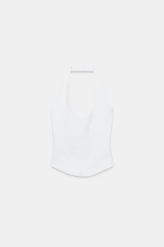 Top made from a cotton blend yarn. Halter neck and round neckline. Rounded hem. | Zara UK