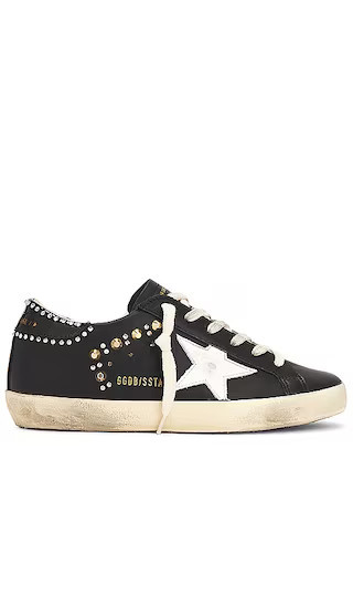 Golden Goose Super Star Sneaker in Black & White. - size 42 | Revolve Clothing (Global)