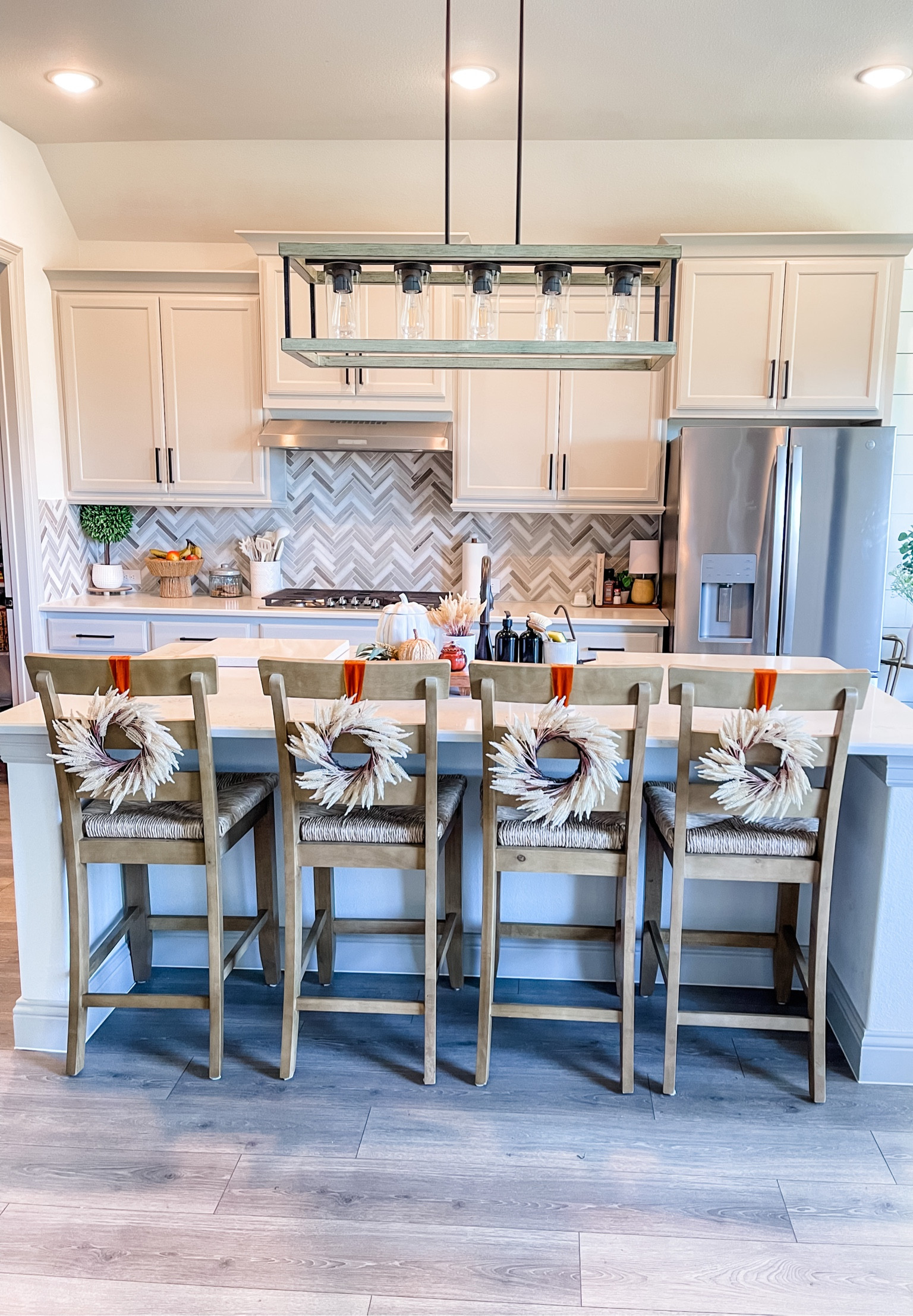 Kitchen fall decor 
Counter height stools 
Mini Fall Wreaths 

#LTKSeasonal #LTKhome #LTKsalealert