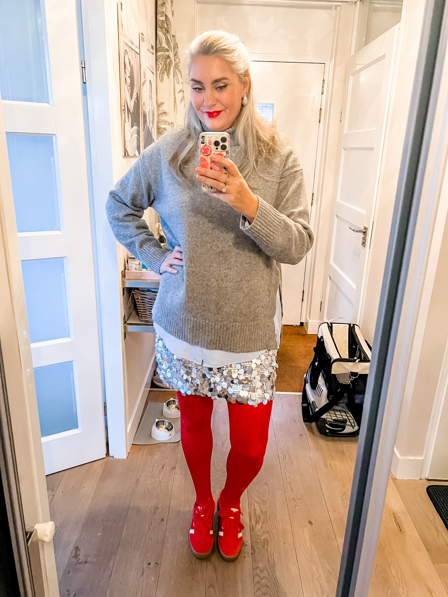 Ootd - Saturday. Cozy Holiday vibes in a grey oversized wool sweater over a light blue button down shirt paired with a sequin skirt, red tights and red sneakers. 



#LTKpartywear #LTKwinter #LTKnederlands