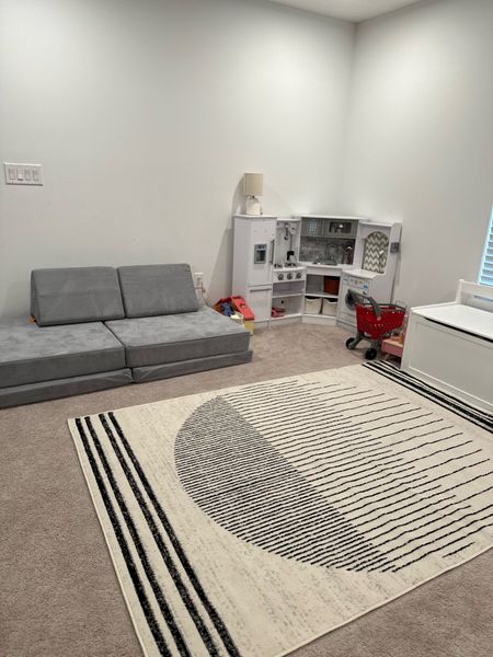 Kids playroom. Love the way this rug looks in this space! 