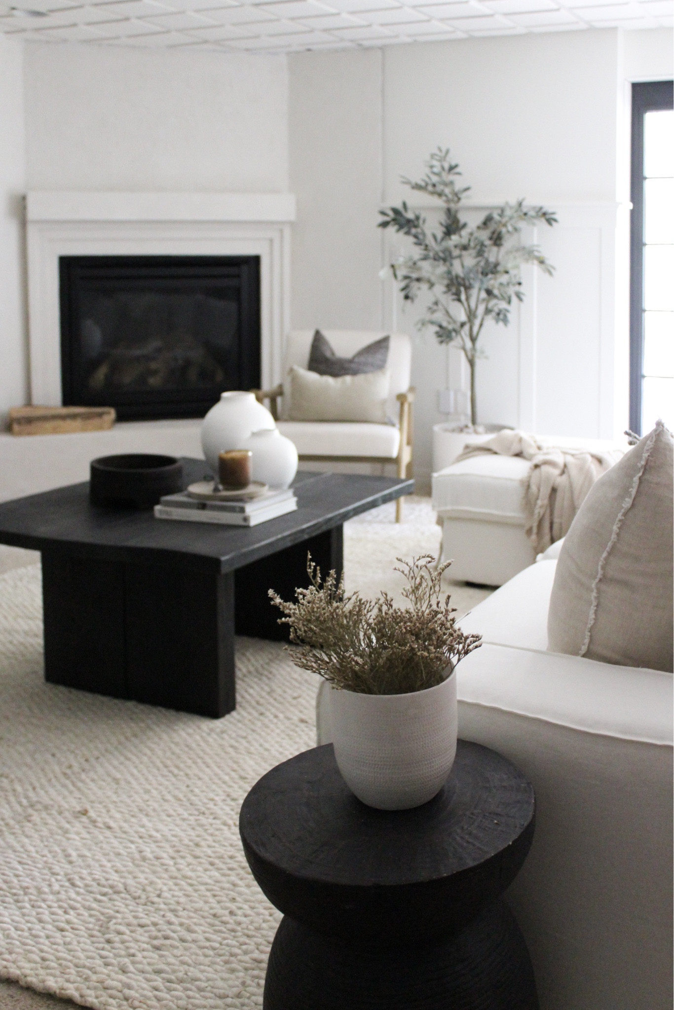 family room - my new linen slipcover is from comfort-works more details on the blog graceoaksdesigns.com/blog

Black coffee table. Coffee table. Living room. Family room. Linen sofa. sofa. Sectional. End table. Side table. Designer look for less. Drum table. Target furniture. Throw pillows. Summer decor. Neutral decor. Neutral living room. Studio McGee. McGee & co. Olive tree. Home decor. Dried florals. Summer styling  jute rug neutral rug rugs USA 

#LTKsalealert #LTKhome #LTKunder50