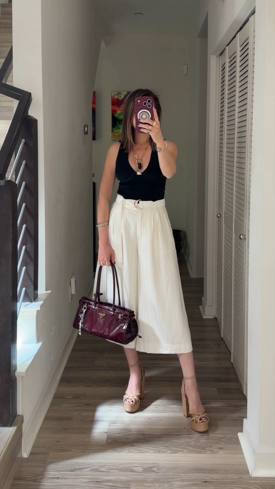Spring outfit ⚡️ This deep v neck top is so flattering, styled with white pinstripe culottes that are so chic. Plus these sky high raffia platform sandals that are so comfortable. The IT heel this season that sold out everywhere. I found it in stock for you. My burgundy designer shoulder bag has been on heavy rotation. I always get compliments on it. 

Spring outfit, ootd, going out top, shorts, culottes, trousers, platform heels, gold jewelry, designer bag, shoulder bag, Prada bag, Abercrombie, The Stylizt 



#LTKootd #LTKOver40 #LTKSaleAlert