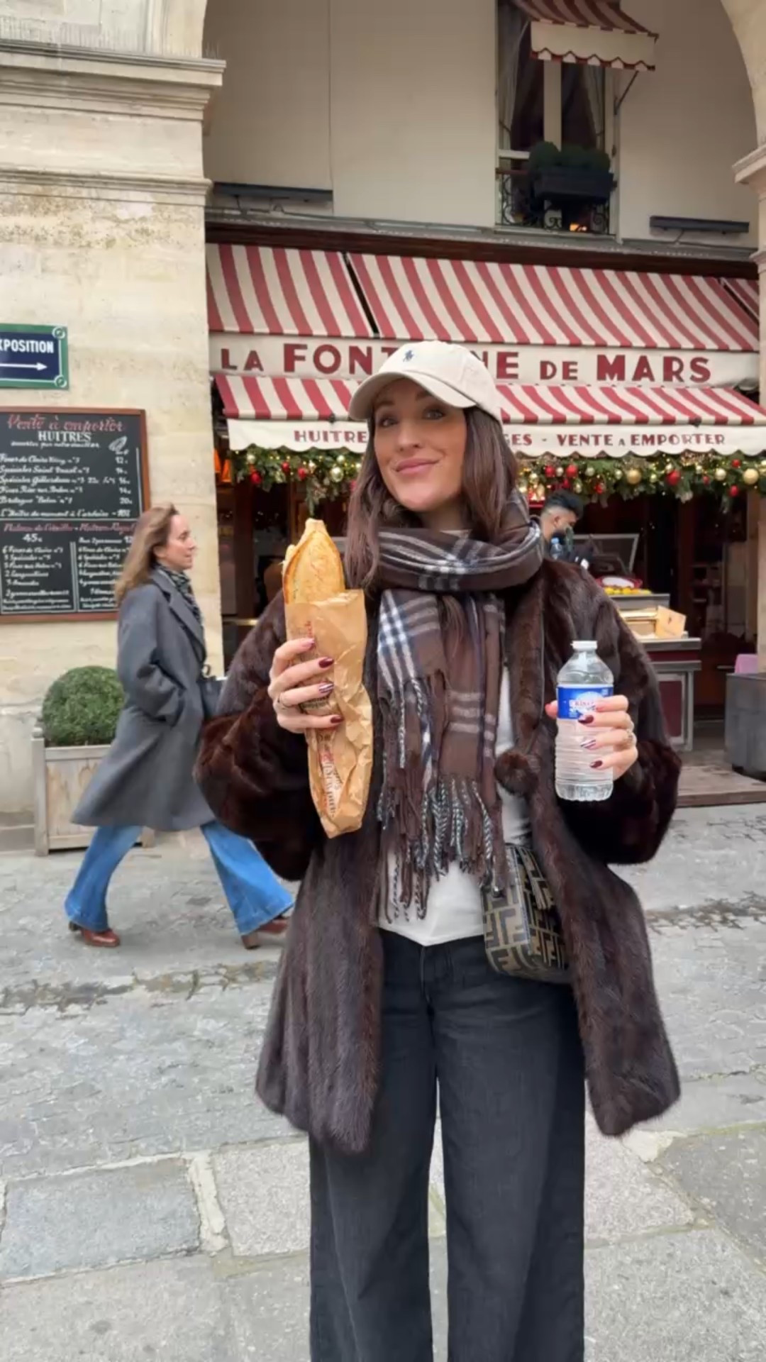 When in Paris… eat all the bread! Chic Parisian  street style. Fur coat, plaid scarf, polo cap

#LTKootd #LTKTravel