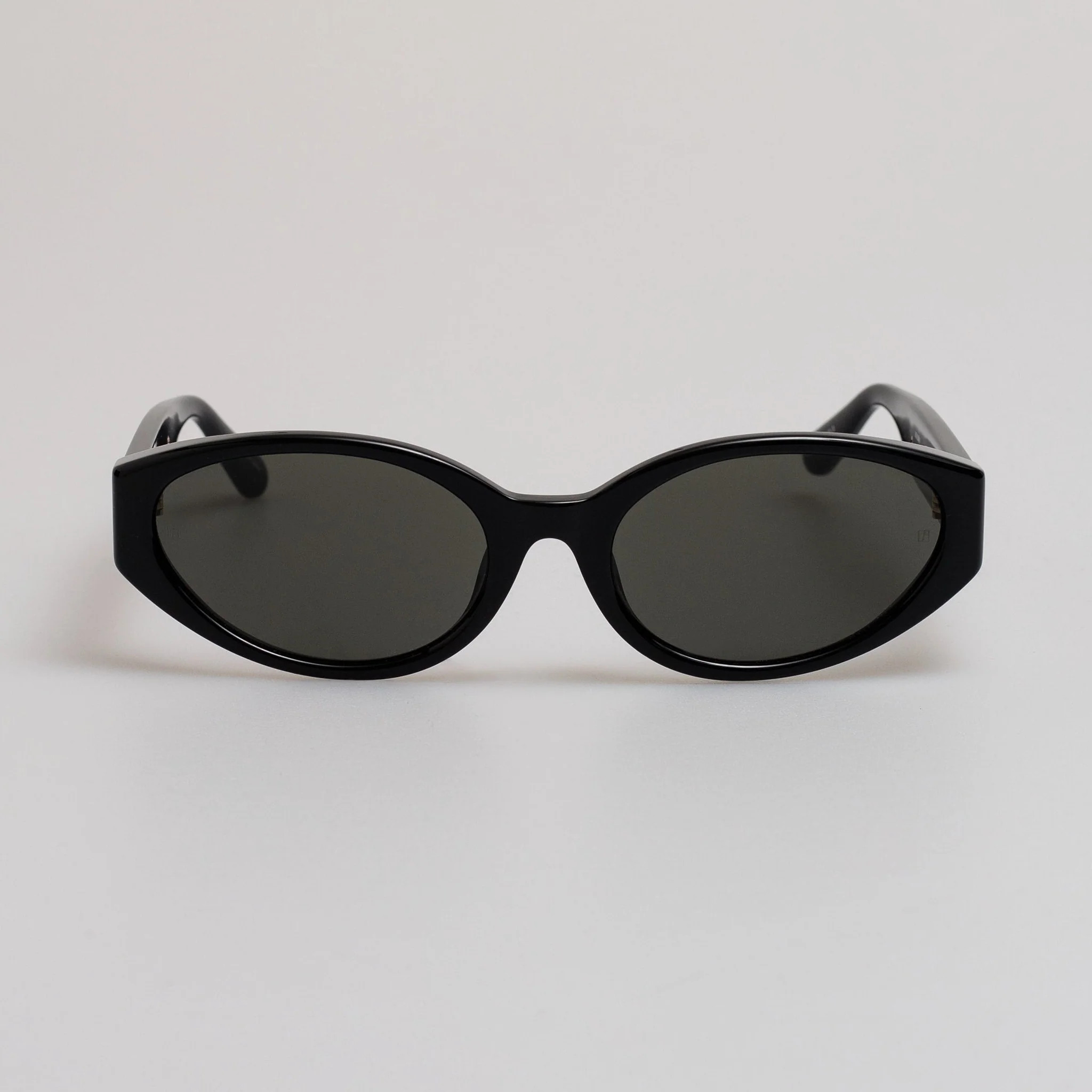 Lyra Oval Sunglasses in Black | Linda Farrow