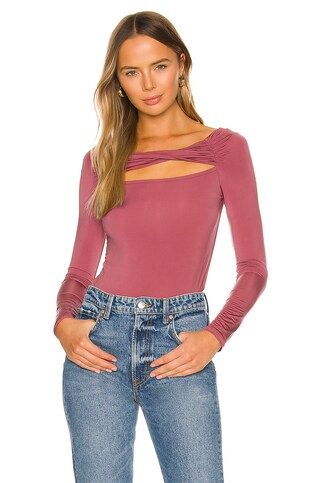 JONATHAN SIMKHAI STANDARD Ishani Slinky Jersey Long Sleeve Twist Top in Plum from Revolve.com | Revolve Clothing (Global)