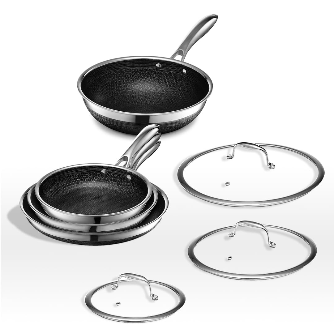 HexClad 7 Piece Hybrid Stainless Steel Cookware Set - 6 Pc Pan Set with Lids and 10 Inch Wok, Sta... | Amazon (US)