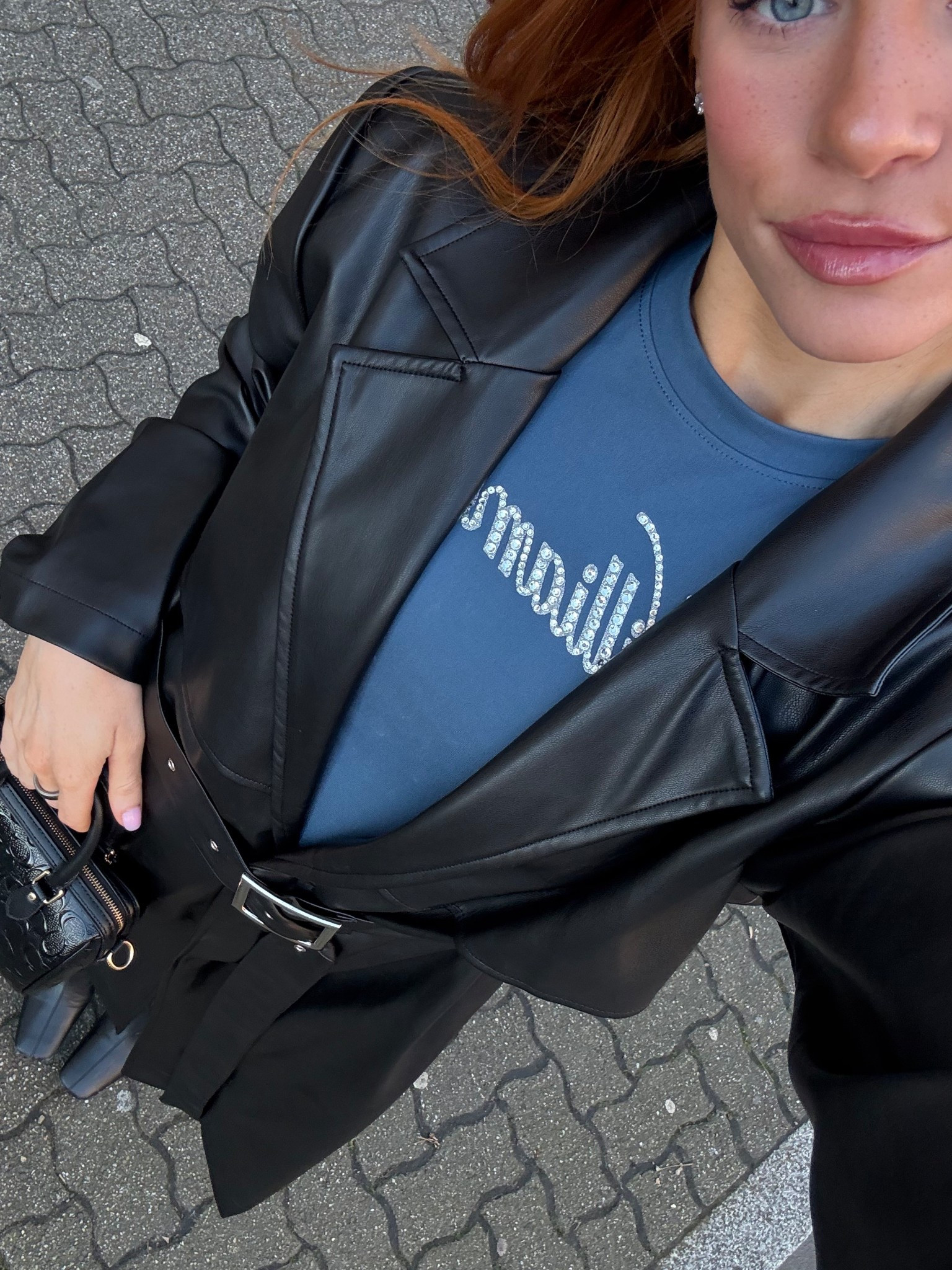 Black leather trench coat