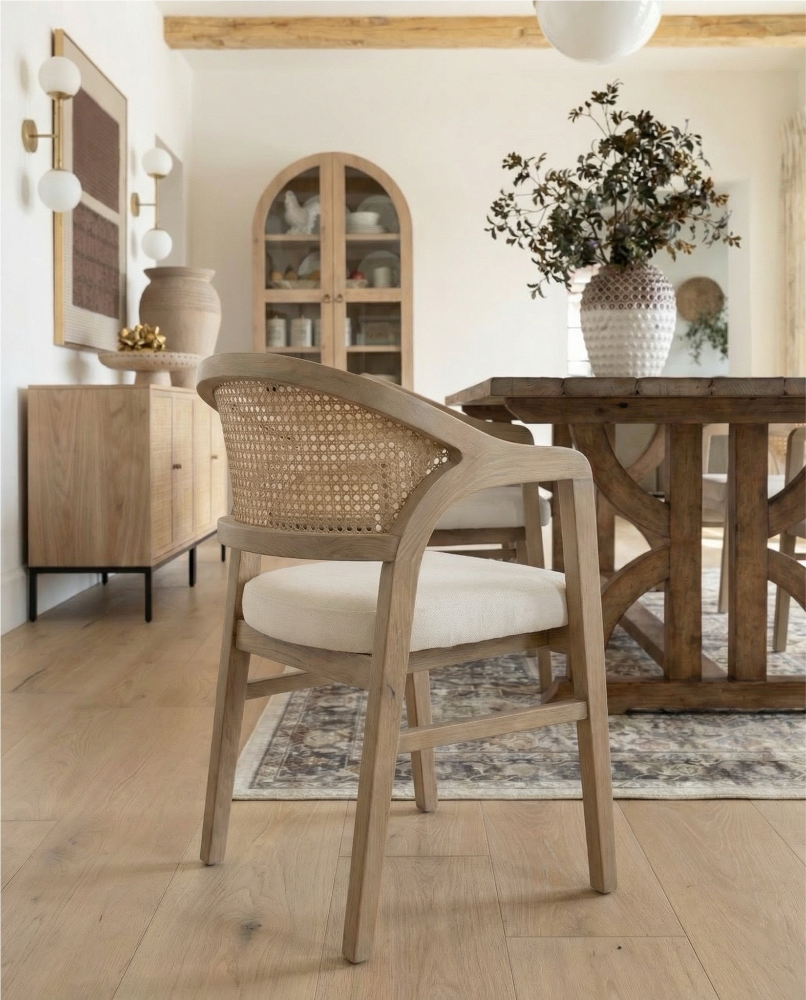 Dining Room Furniture
	•	Rustic solid wood dining table
	•	Natural oak cane dining chairs
	•	Light wood dining room cabinet
	•	Arched wood glass display cabinet
	•	Cane front sideboard cabinet

Lighting
	•	Brass globe pendant light
	•	Modern brass globe wall sconces
	•	Mid century globe wall light
	•	Frosted glass globe chandelier

Rugs
	•	Neutral vintage style area rug
	•	Beige distressed traditional rug
	•	Vintage runner rug neutral tones
	•	Neutral Persian style rug

Decor
	•	Large ceramic textured vase
	•	Neutral ceramic decorative vase
	•	Faux olive branch stems
	•	Dried neutral floral stems
	•	Decorative terracotta  bowl centerpiece
	•	Neutral table centerpiece bowl

Wall Decor
	•	Vintage floral framed wall art
	•	Traditional floral oil painting
	•	Gold frame vintage art print
	•	Neutral vintage botanical wall art

Dining Table Styling
	•	Rustic wood dough bowl
	•	Decorative brass tray centerpiece
cabinet
Kitchen / Coffee Bar Decor
	•	Glass coffee mugs

	•	Neutral ceramic pitcher vase
	•	Decorative 

#LTKHome #LTKSaleAlert