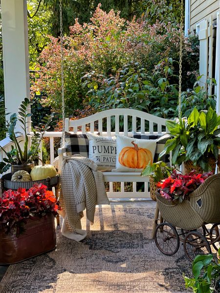 Front porch swing decorated for fall. Cozy home, farmhouse, porch swing, front porch decor, fall decor, throw pillows farmhouse style, garden, cottagecore, houseplants, boho farmhouse

#LTKsalealert #LTKSeasonal #LTKhome