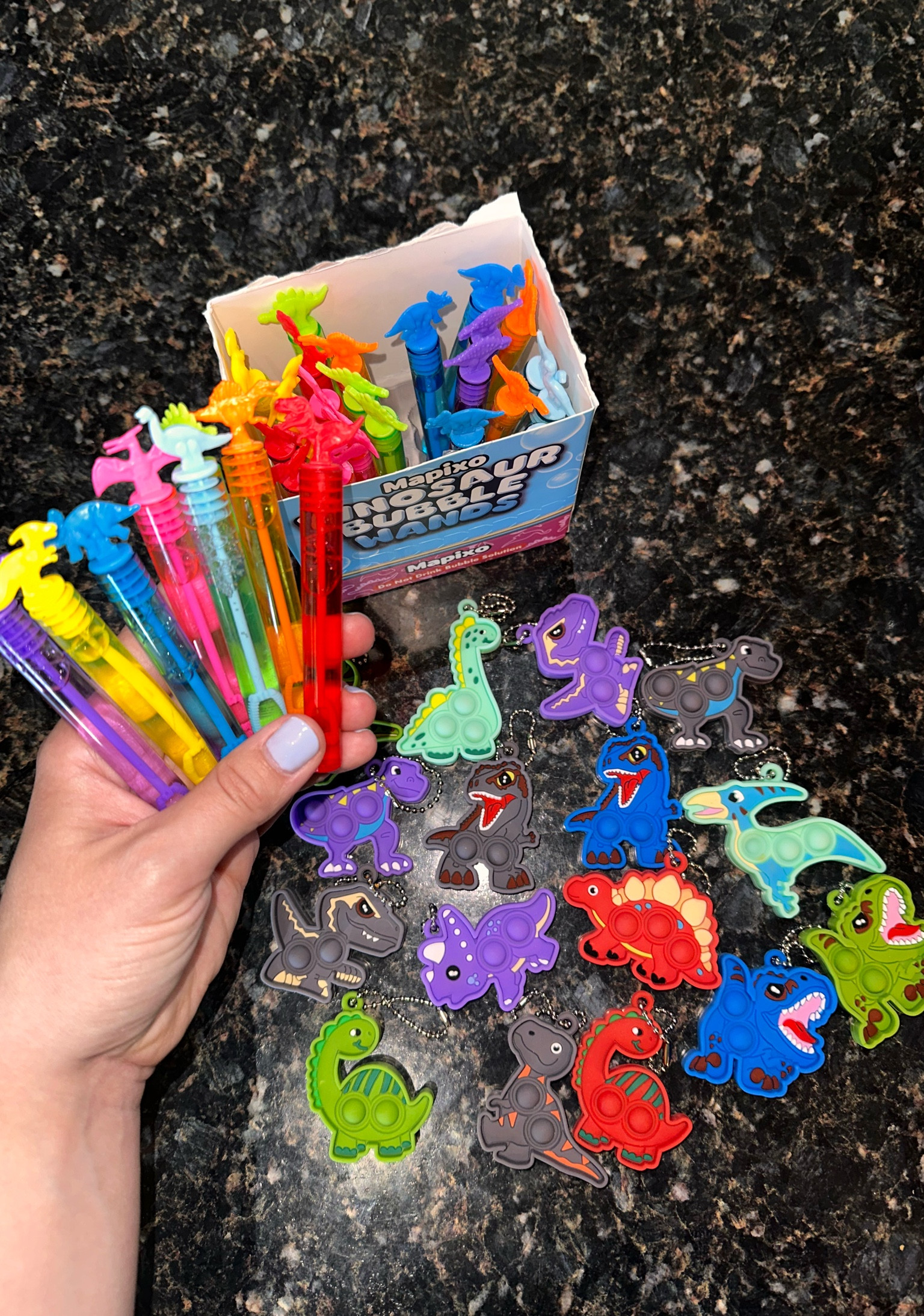 Kids Dino themed birthday party favors!! 🦕 🦖 


My baby boy turns THREE next week and like most little boys, he’s obsessed with all things Dino’s and he has loved playing with these little pop-it’s/ adding them to his little backpack & how CUTE are these tiny bubbles!? 

#dinoparty #partyfavors #threeyearold #boysbirthday 