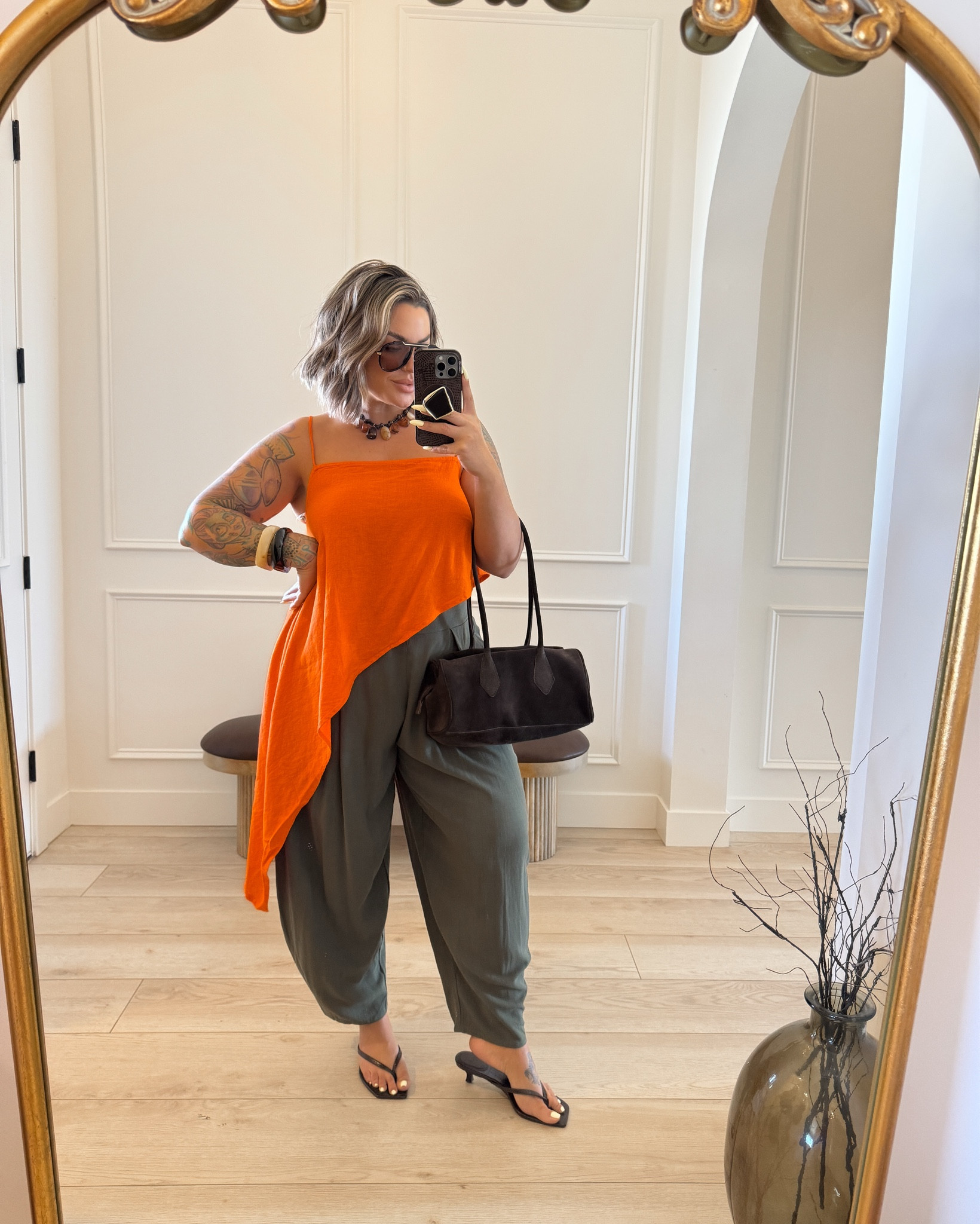New free people finds 

Orange top XL 
Green pants Amazon L ( hang dry only or they will get super short ) 
Grey/black top M it’s very oversized size down. ( white jeans are old from Zara linked a similar style they have out now. I do a 12 in Zara jeans ) 
Dresses I did a L they are super cute but very short on me I’m 5’5 with short torso and longer legs if that helps. 
If you are shorter than me and have shorter legs it probably won’t be as short. 
Bright green pants L 
Cape top M it’s oversized can be worn 2 ways as shown In the photos. 