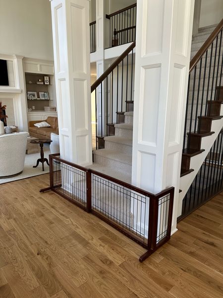 Looking to baby proof without sacrificing style? Try this gate! We have these at the bottom of staircases (not safe at the top). Easy for adults and big kids to step over and enough of a block for babies without ruining your walls or posts!

#LTKhome #LTKbaby #LTKkids