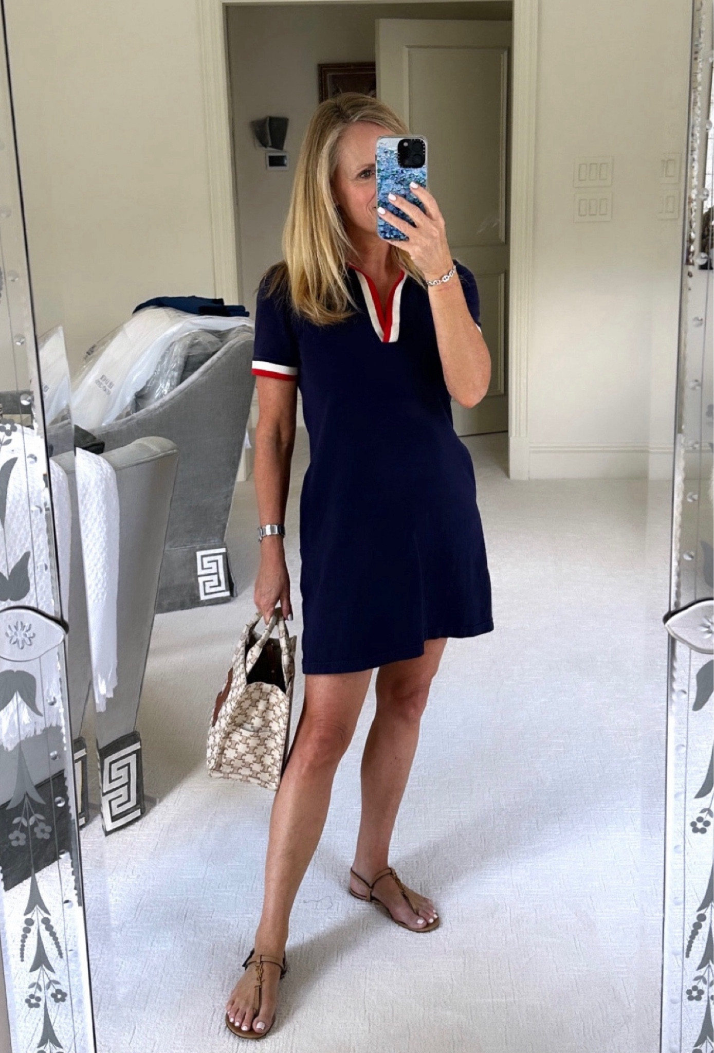 The best casual dress for fall
Navy polo dress from Tuckernuck 
Fits true to size I’m 5‘2” tall and wearing extra small 
Easy to pair with sandals or sneakers 
YSL tan, leather sandals, and Celine logo mini tote

#LTKSeasonal #LTKOver40 #LTKStyleTip