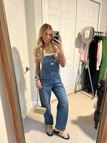 Levi’s overalls. Cuts clothing tomboy cropped tee. Tory Burch gold purse. Casual Friday outfit. Electric picks jewelry. #outfit #fashion #style #ootd #ootn #outfitoftheday #fashionstyle  #outfitinspiration #outfitinspo #tryon #tryonhaul#lookbook #outfitideas #currentlywearing #styleinspo #outfitinspiration outfit, outfit of the day, outfit inspo, outfit ideas, styling, try on, fashion, affordable fashion. 

#LTKstyletip #LTKSeasonal #LTKfindsunder100